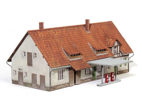 Picture of Old blacksmith's shop with petrol station