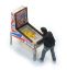 Picture of Pinball machine with figure
