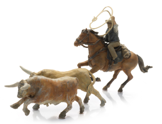 Picture of Cowboy lassoing Longhorns